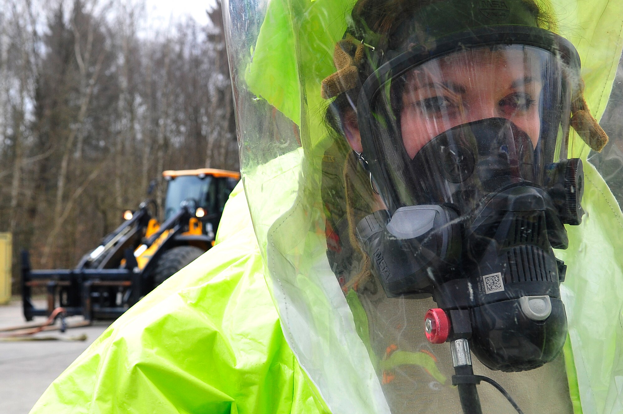 Airman 1st Class Madeline Setere, 786th Civil Engineer Squadron emergency manager, gears up for a hazardous material scenario during Silver Flag 2015 exercise training at Ramstein Air Base, Germany on March 21, 2015. The civil engineer Airmen went through an eight-day training course to test their readiness for a real-world situation. (U.S. Air Force photo/Airman 1st Class Larissa Greatwood)