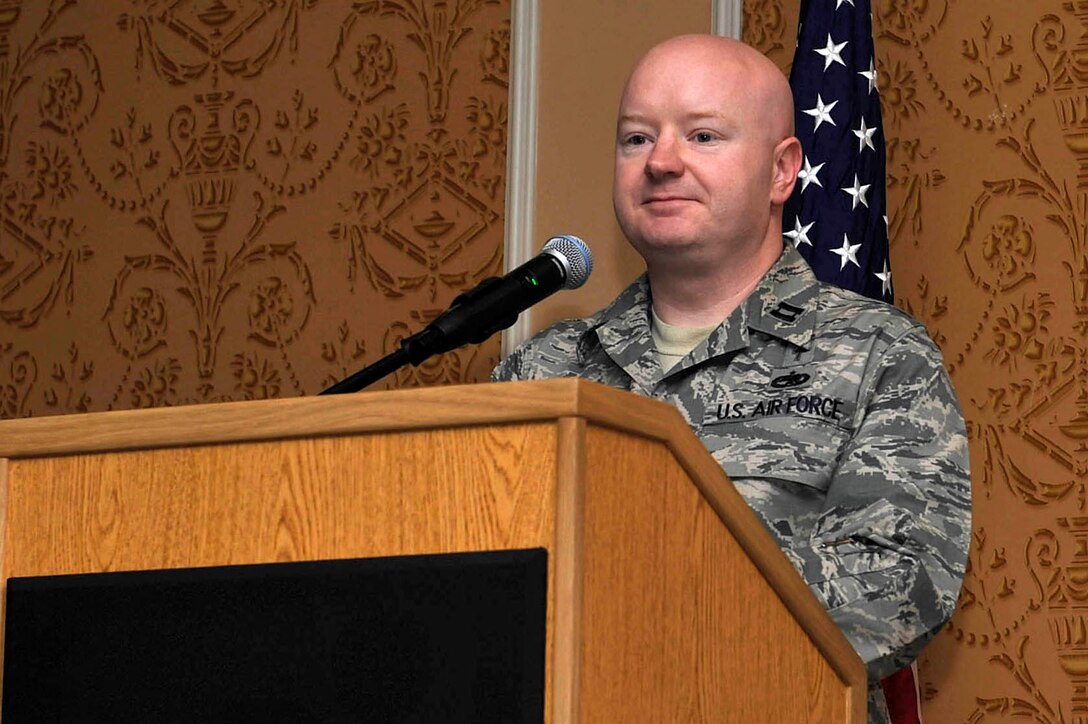 U.S. Air Force Chaplain [Capt.] Michael McDonald, 633rd Air Base Wing chaplain, welcomes U.S. Service members and friends to the 2015 National Prayer Breakfast Observance at Langley Air Force Base, Va., March 25, 2015. The breakfast featured scriptures, prayers and a guest speaker. (U.S. Air Force photo by Senior Airman Breonna Veal/ Released)