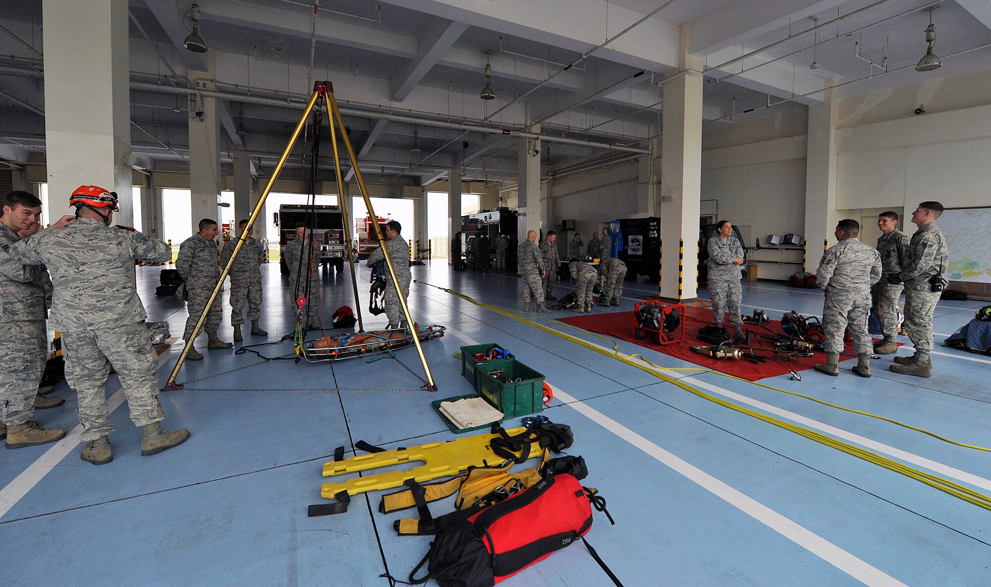 Equipment for firefighting, hazardous material decontamination, and explosive ordinance disposal is displayed for company grade officers during the Model Program on Kadena Air Base, Japan, March 25, 2015. The company grade officers we given an interactive tour of various units where they learned the installation's capabilities. (U.S. Air Force photo by Naoto Anazawa)