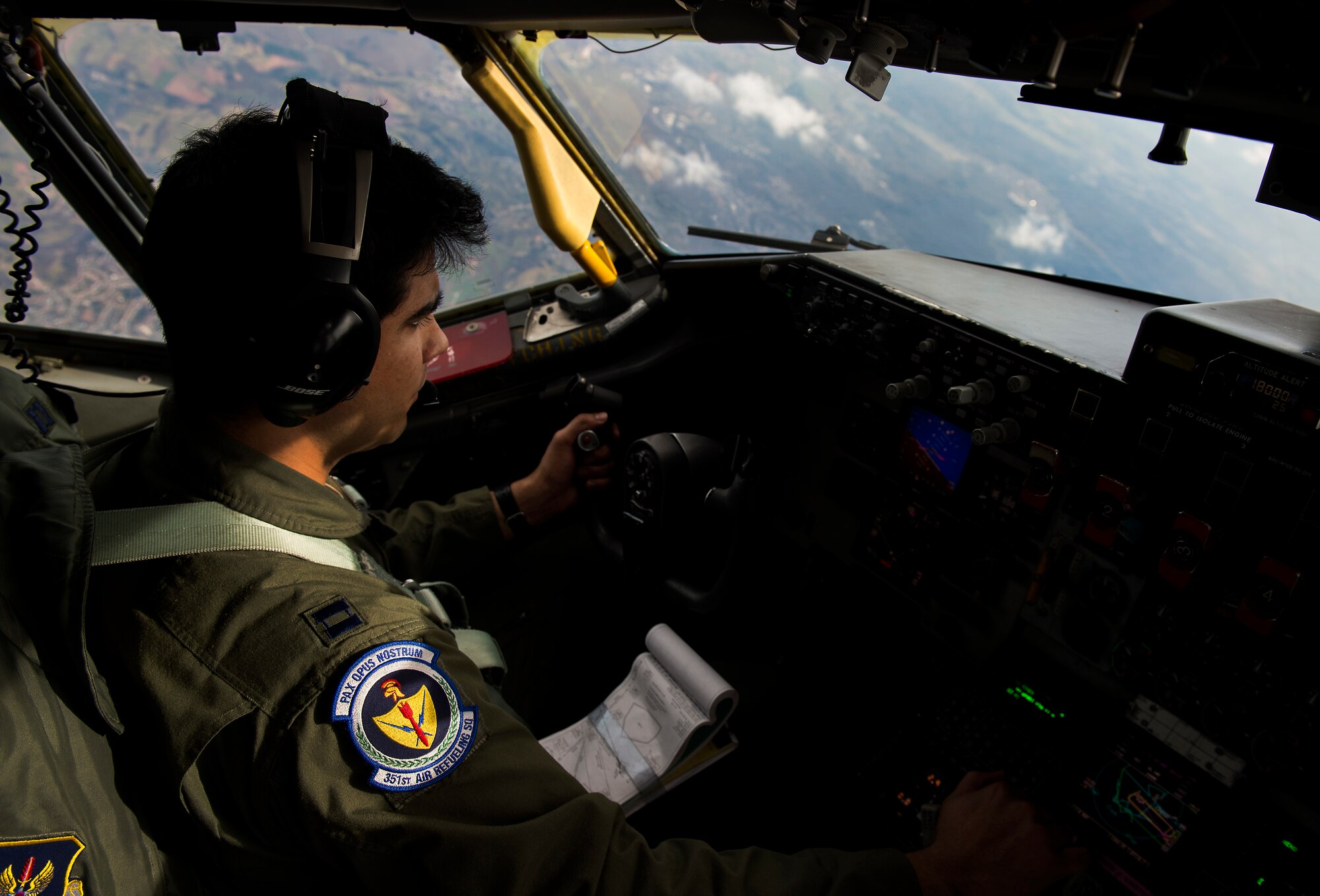 Capt. Paul Anguita, 100th Air Refueling Wing pilot, flies a KC-135 Stratotanker above Ramstein Air Base, Germany, March 26, 2015. Aircrew and a KC-135 from Royal Air Force Mildenhall, England, spent multiple days at Ramstein performing refueling missions for A-10 Thunderbolt IIs. Pilots also took part in aircraft commander upgrade training, helping them progress to the next level of their career. (U.S. Air Force photo/Senior Airman Damon Kasberg)