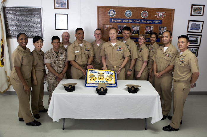 Chief petty officers pose for a picture during their 122nd birthday celebration aboard Marine Corps Station Iwakuni, Japan, April 1, 2015. The grade of Chief Petty Officer was established in 1893 due to the requirements and needs for senior leadership.