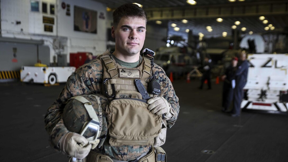 U.S. Marine Corps Cpl. Jeremiah Skaggs poses in the hangar bay of the USS Bonhomme Richard, at sea, March 16, 2015. Skaggs, from Stockton, California, has trained in multiple environments including Bridgeport, California, Twentynine Palms, California, Okinawa, Japan, and now aboard the USS Bonhomme Richard. Skaggs is a squad leader with Weapons Co., Battalion Landing Team 2nd Battalion, 4th Marine Regiment, 31st Marine Expeditionary Unit and is currently participating in the MEU’s annually-scheduled Spring Patrol of the Asia-Pacific region. 