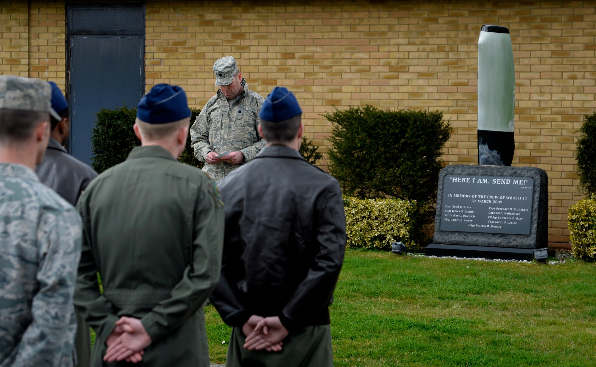 U.S. Air Force Lt. Col. Richard Greszler, 352nd Special Operations Support Squadron commander, speaks about the Airmen he once knew during a remembrance ceremony March 31, 2015, on RAF Mildenhall, England. The ceremony was held in honor of the 10th anniversary of the nine Airmen who died when WRATH-11, an MC-130H Combat Talon II assigned to the 7th SOS, crashed in Albania in 2005. (U.S. Air Force photo by Senior Airman Victoria H. Taylor)