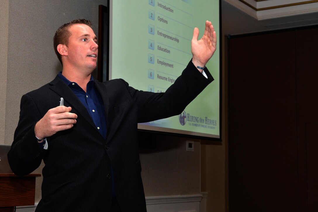 Dakota Meyer, Marine Medal of Honor recipient, and Virginia Brewer, lead education trainer with Hiring Our Heroes, spoke to Marines at the Clubs at Quantico on March 25. "It's like dating," said Meyer about the search for a job. Your elevator speech is your pick up line, your resume is your Facebook page, he added
