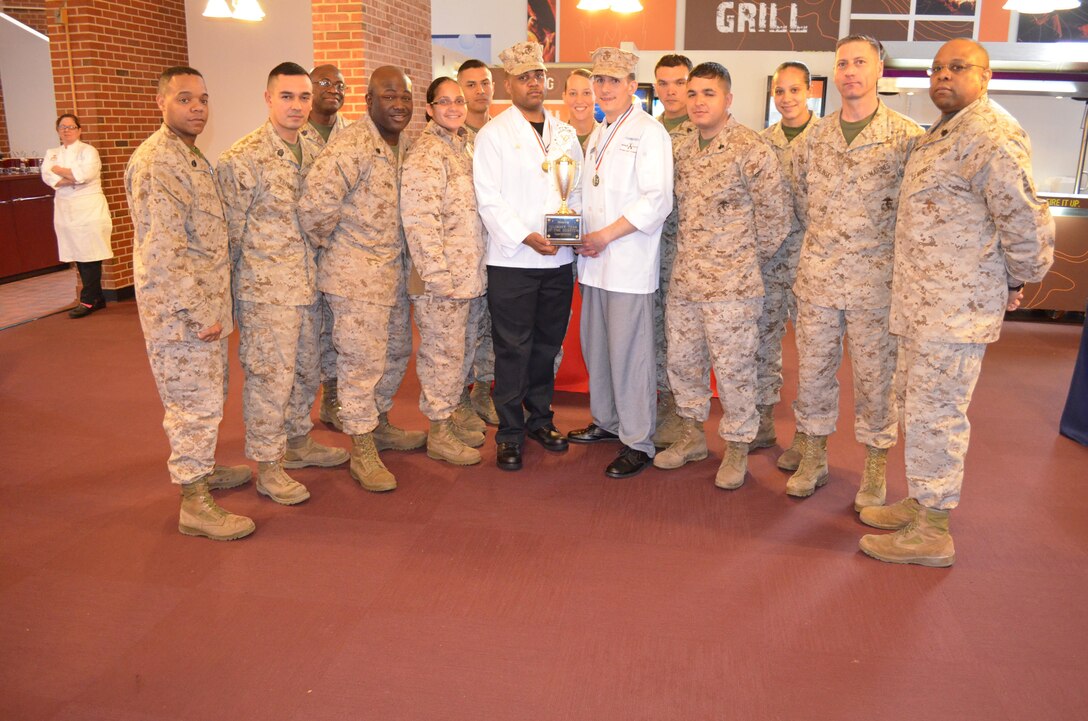 Three teams of two chefs competed in the quarterly cooking competition held in Bruce Hall aboard Marine Corps Base Quantico March 25. None of the team members had worked together before and were only able to meet and discuss the menus briefly before the competition. Despite their lack of familiarity with each other’s cooking style, Sgt. Justin Clairmont and Cpl. Leroy Johnson, both of Bruce Hall, took first place in both the formal judging and the people’s choice contest.