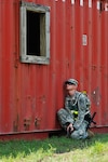 Army Private First Class William Stein, Joint Task Force-National Scout Jamboree, kneels while participating in an exercise in preparation for the 2010 Boy Scouts of America jamboree July 22, 2010. More than 35 first responders tested their ability to react under pressure during the exercise. The JTF’s goal is to provide professional military support and a safe and secure environment for scouts and visitors during the event. The Department of Defense’s presence and effort at the NSJ emphasizes commitment to the nation’s youth.