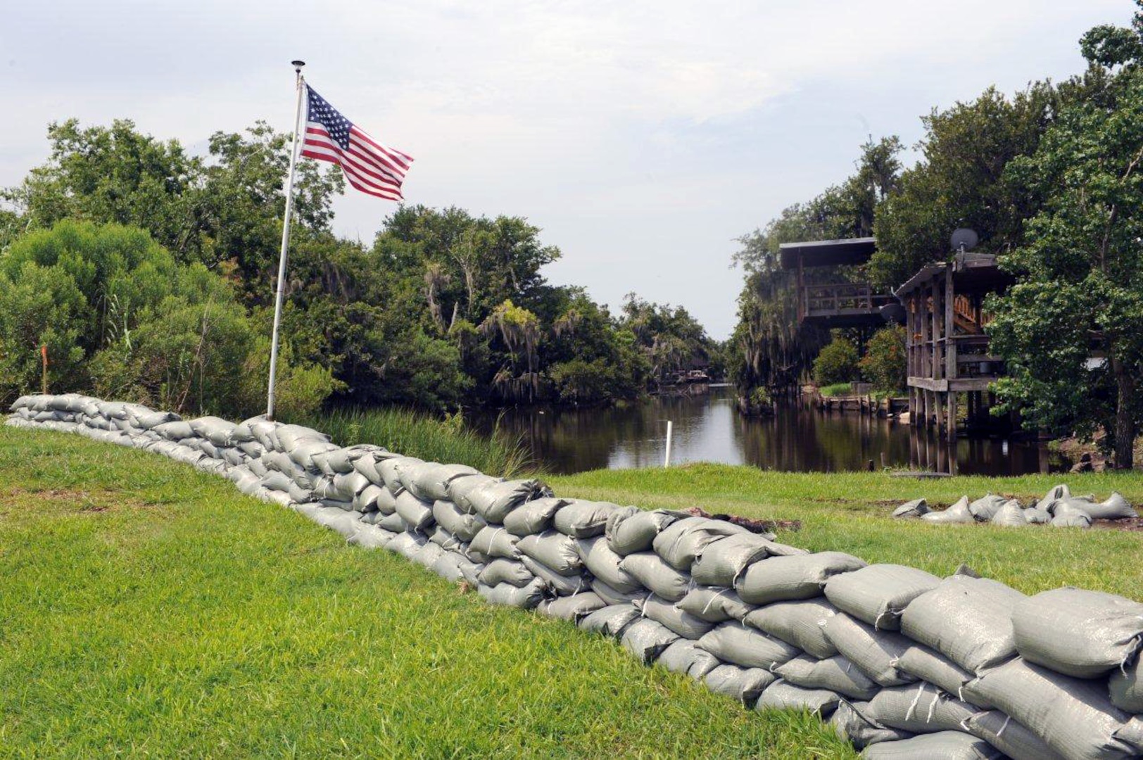 More than 22,000 sandbags were laid by the Louisiana National Guard's 528th Engineer Battalion, 225th Engineer Brigade, to reinforce the back levee between La Reussite and West Pointe à la Hache, in Myrtle Grove, La., over the last three weeks. "It was a joint operation between the parish and National Guard,” said Blair Rittiner, Plaquemines Parish land department superintendent. “We filled and delivered the sandbags, and the Guard unloaded and placed the bags. We couldn't have done it without the help of the National Guard."