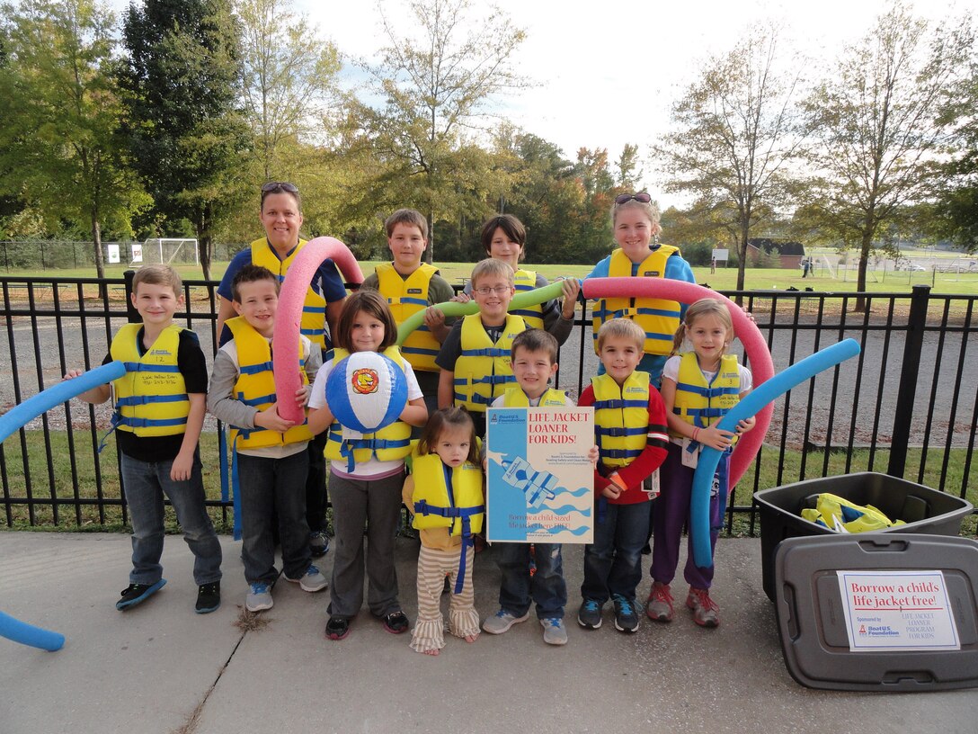 Students from the Putnam County School System wear BOAT US Foundation Life jackets to illustrate the importance of water safety in Cookeville, Tenn. The U.S. Army Corps of Engineers Nashville District park rangers and staff at Dale Hollow Lake are continuing to help keep kids and adults safe while recreating at area lakes and on the water by participating in the Boat US Foundation Life Jacket Loaner Program for kids! (USACE Photo by Sondra Carmen)