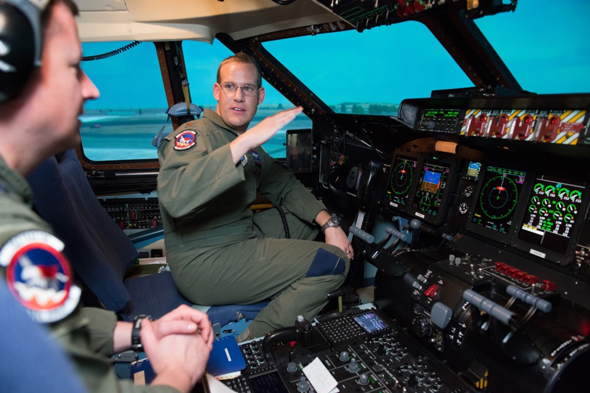 A C-5M aircrew prepared for its record-establishing flight by going over flight plans and training March 30 in a C-5M simulator at Travis Air Force Base, Calif. The crew was scheduled for an early April 3 flight to set a multitude of records. (U.S. Air Force photo/Ken Wright)