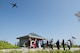 A C-5M Super Galaxy from the 22nd Airlift Squadron at Travis AFB, California, flies overhead in a moving tribute to Master Sgt. Robert Foster during his interment at the Sacramento Valley National Cemetery in Dixon, California on March 31, 2015. (U.S. Air Force photo/Ken Wright)
