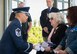 Master Sgt. Nelson Almanzor, NCO in charge of the Travis Honor Guard, presents Mrs. Jean Foster, widow of Master Sgt. Robert Foster an American flag during his interment at the Sacramento Valley National Cemetery in Dixon, California, March 31, 2015.
Sergeant Foster served in the U.S. Army Air Corps in World War II, and was a prisoner of war by the Japanese Army for more than three years in the Philippines. Following the interment ceremony, a C-5M Super Galaxy flew overhead in a moving tribute. (U.S. Air Force photo/Ken Wright)
