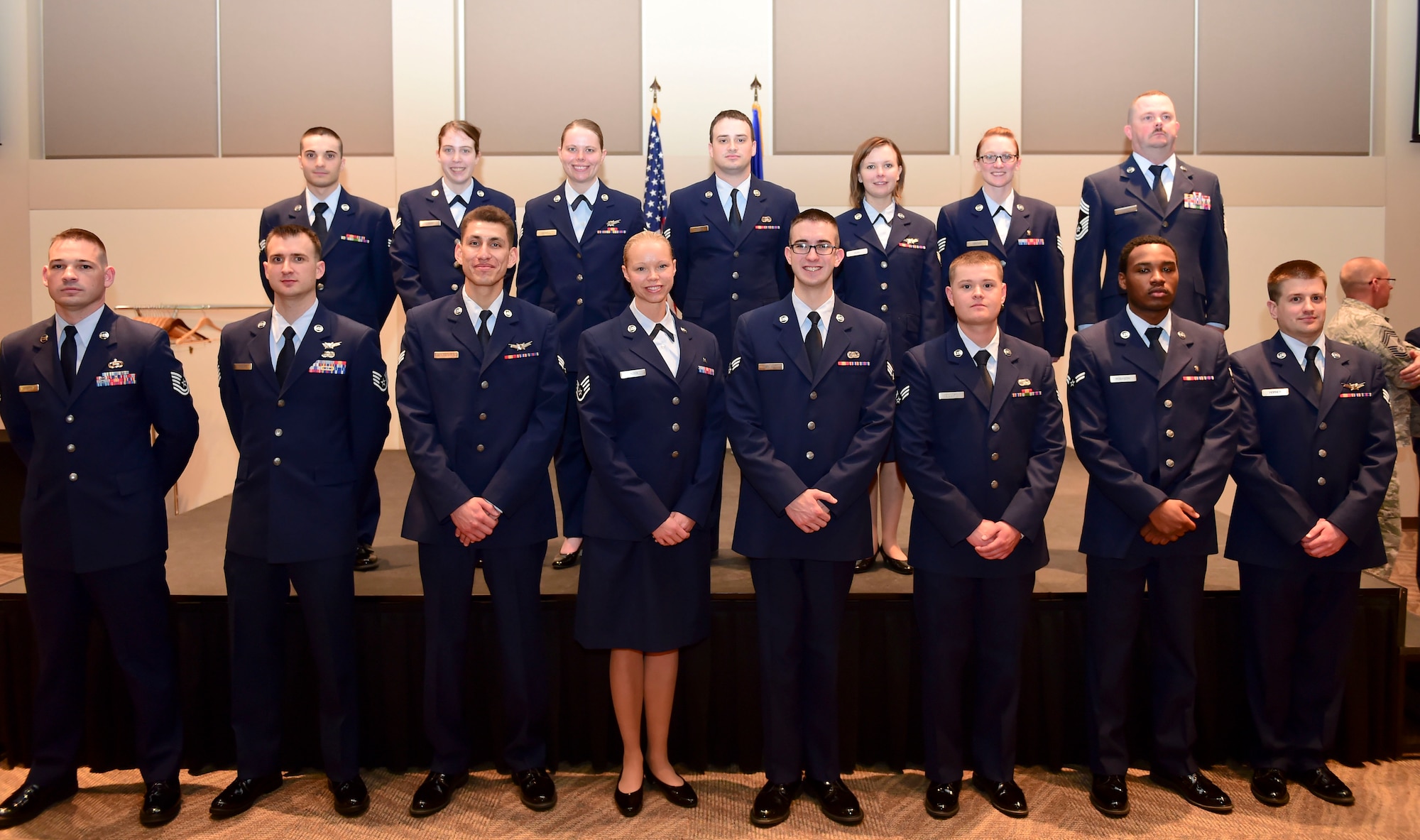 Fifteen Buckley members were promoted March 31, 2015, at the Leadership Development Center on Buckley Air Force Base, Colo. These Airmen were honored by their co-workers, families and friends for being promoted to the next rank. (U.S. Air Force photo by Airman 1st Class Luke W. Nowakowski/Released)
