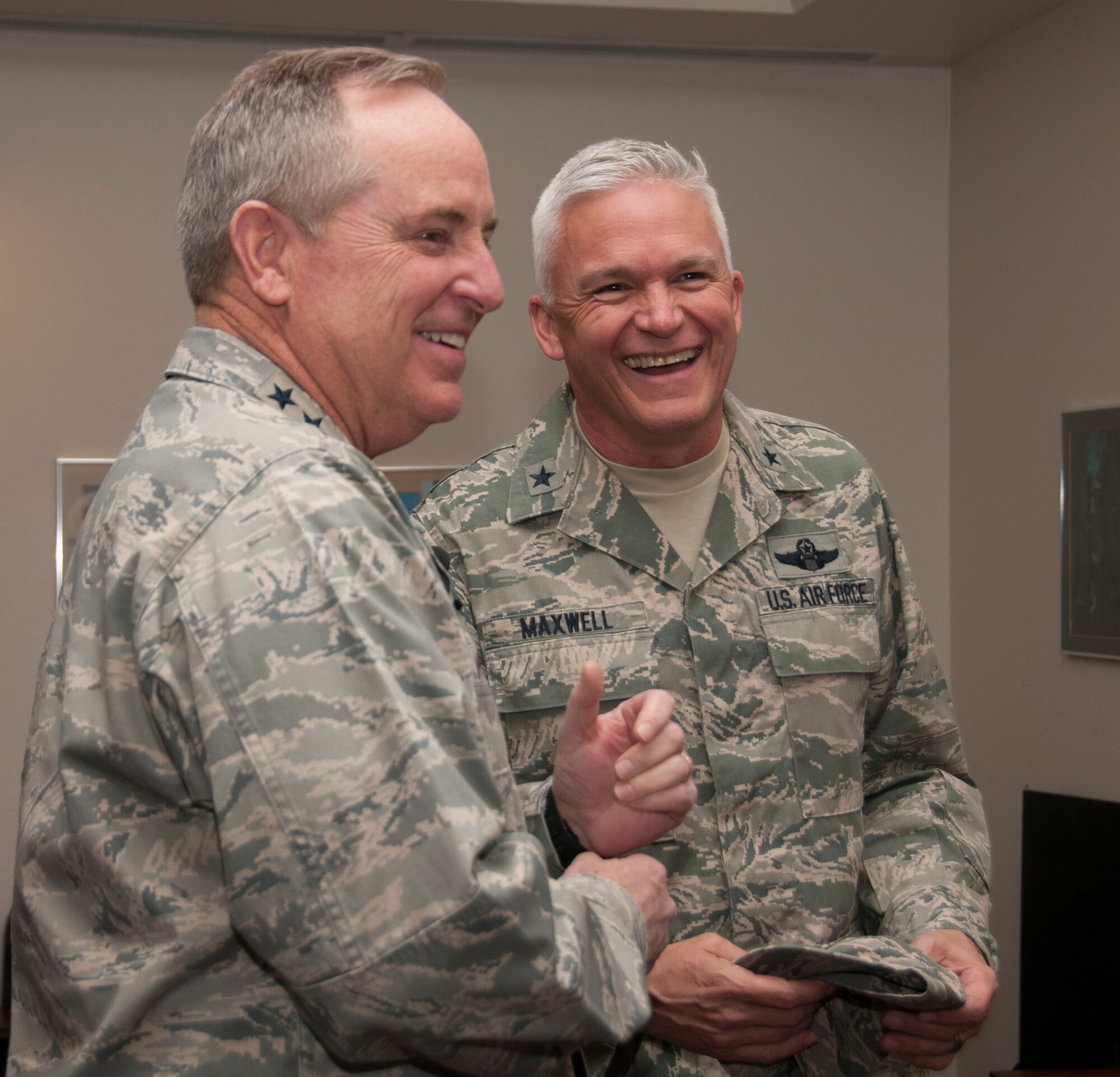 Air Force Chief of Staff Gen. Mark A. Welsh III visits with Gen. Edward 
P. Maxwell, the Commander of the Arizona Air National Guard, during Welsh's 
visit to the 162nd Wing, Tucson International Airport Air National Guard Base, 
Arizona, on March 26. (U.S. Air National Guard photo by Staff Sgt. Gregory 
Ferreira)
