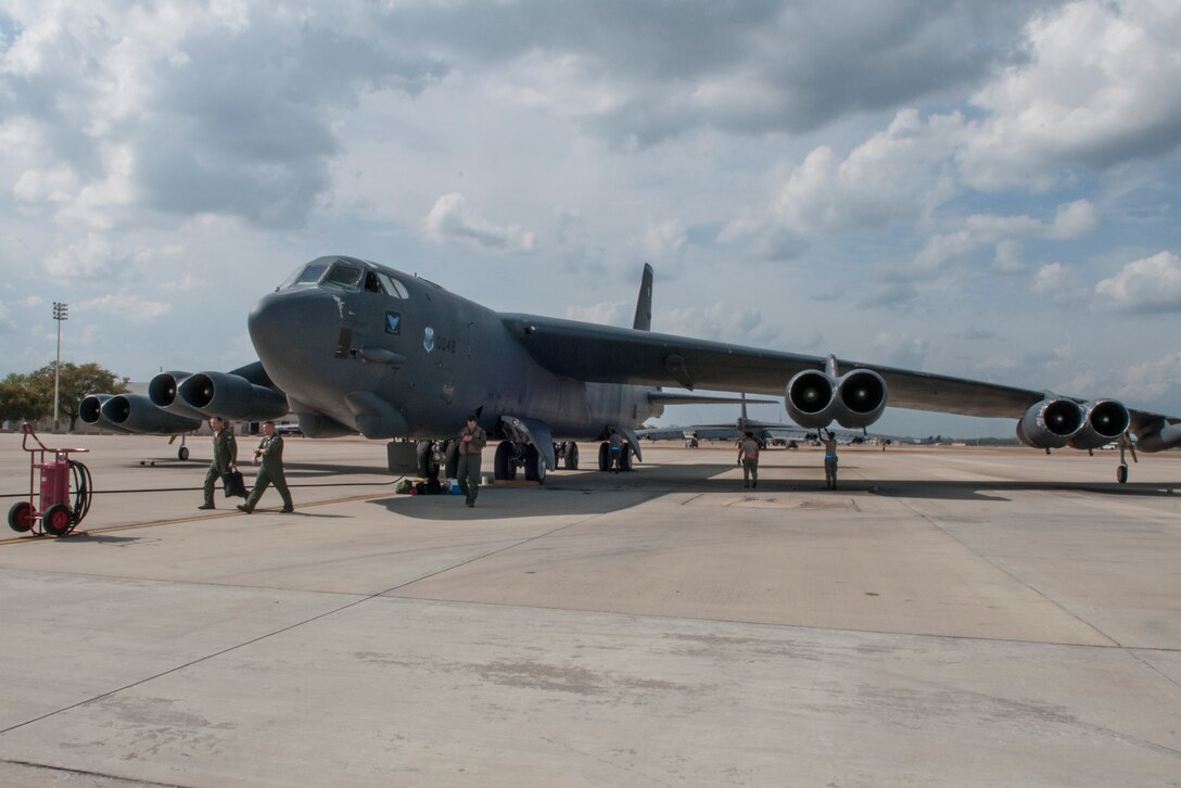 U.S. Air Force aircrew from the 307th Bomb Wing and aircraft maintenance Airmen from the 2nd Bomb Wing run last minute checks on their B-52 Stratofortress before leaving in support of Exercise “Polar Growl” on Barksdale Air Force Base, La. April 1, 2015. These aircraft will conduct simultaneous, long-range sorties from Barksdale to the Arctic and North Sea regions. These bomber operations provide a flexible and visible signal that highlights the U.S. ability to deter strategic attacks and respond to any potential future crisis or challenge. (U.S. Air Force photo by Master Sgt. Dachelle Melville/Released)