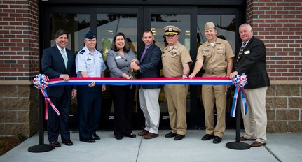 Joint Base Charleston leadership and Naval Exchange officials conduct the official ribbon cutting of the new student NEX April 1, 2015 on Naval Weapons Station Charleston, S.C. By building the student NEX, next to the NNPTC campus, it is much more convenient for students carrying heavy course loads to shop for needed items. The student NEX is also located nearby other establishments focused on the students’ needs. (U.S. Air Force photo/Airman 1st Class Clayton Cupit)