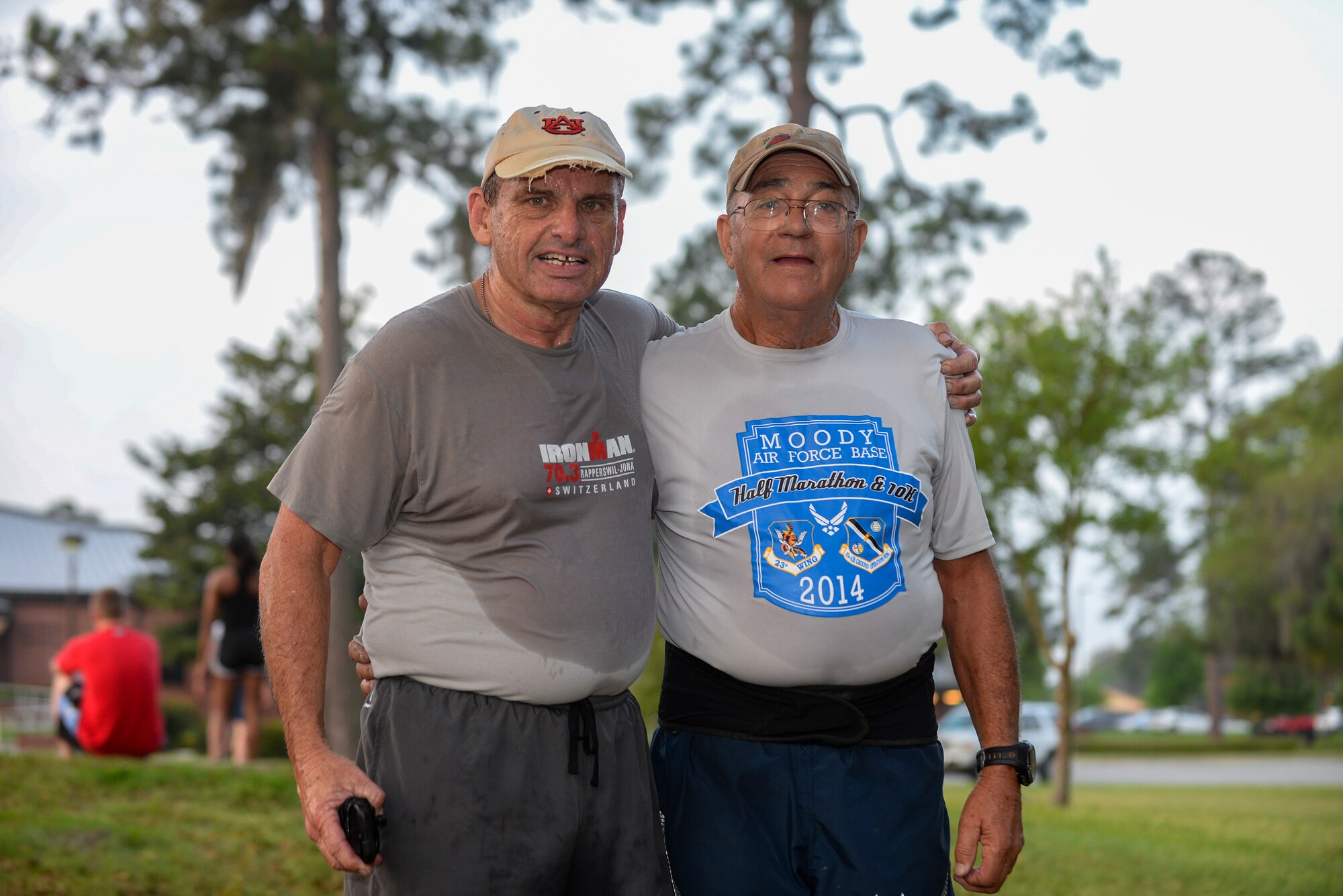 Retired U.S. Air Force Capt. Steve Coin, left, and retired Master Sgt. Joe Christian, pose for a photo following the April Fool’s 5k April 1, 2015, at Moody AFB, Ga. This was Christian’s 1,080th race. (U.S. Air Force photo by Senior Airman Sandra Marrero/Released)