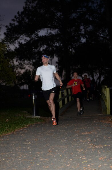 U.S. Airman 1st Class Dallas Remonda, 38th Rescue Squadron aircrew flight equipment technician, starts off the April Fools 5k at April 1, 2015, at Moody Air Force Base, Ga. Remonda won first place. (U.S. Air Force photo by Senior Airman Sandra Marrero/Released)
