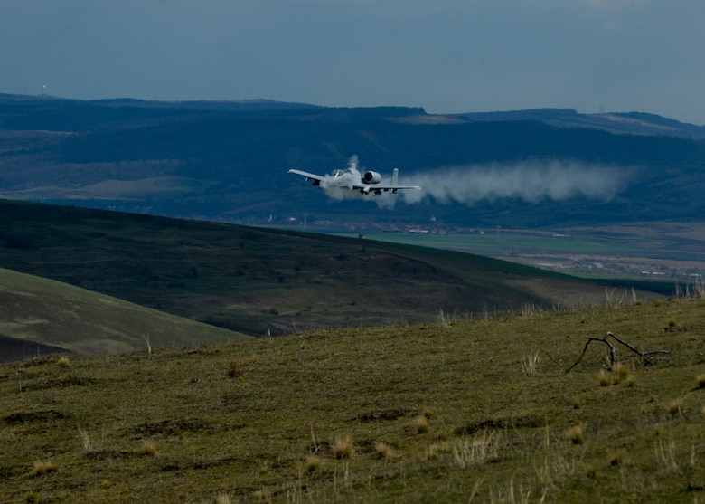A U.S. Air Force A-10 Thunderbolt II assigned to the 354th Expeditionary Fighter Squadron fires its  30mm GAU-8 Avenger rotary cannon during a theater security package deployment at Campia Turzii, Romania, April 1, 2015. The aircraft will forward deploy to locations in Eastern European NATO countries as part of the TSP. (U.S. Air Force photo by Staff Sgt. Joe W. McFadden/Released)