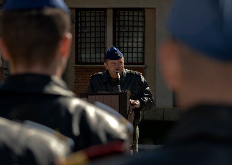 Romanian air force Cmdr. Marius Oatu, commander of the 71st Air Base, speaks during the opening ceremony of Dacian Thunder 2015 at Campia Turzii, Romania, April 1, 2015. The U.S. and Romanian air forces will conduct training aimed to strengthen interoperability and demonstrate the countries' shared commitment to the security and stability of Europe.  (U.S. Air Force photo by Staff Sgt. Joe W. McFadden/Released)