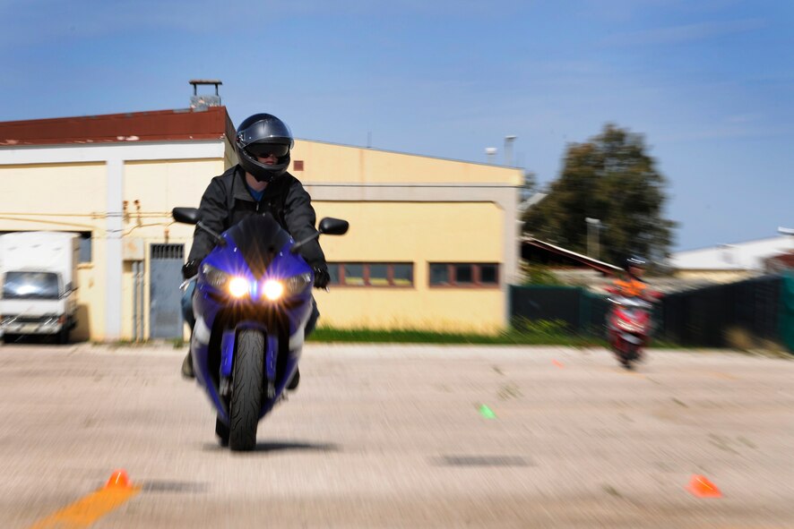 Staff Sgt. Derek Ebersole, Basic Rider Course 2 student, rides his motorcycle during a BRC2 class March 27, 2015, at Incirlik Air Base, Turkey. The students in the course practiced stopping suddenly, swerving, driving through tight turns and other advanced riding techniques. (U.S. Air Force photo by Senior Airman Krystal Ardrey/Released)