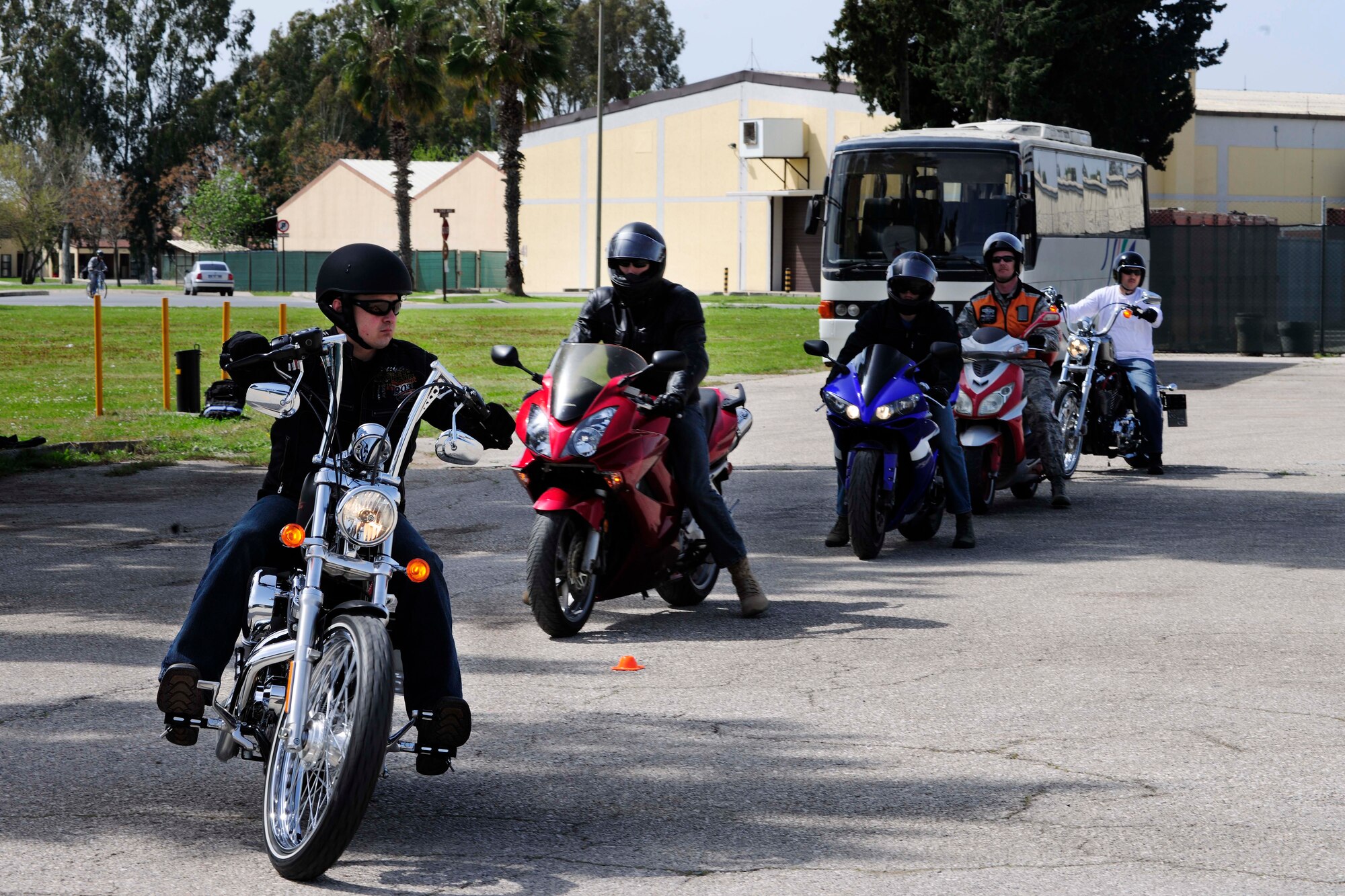 Students of a Basic Rider Course 2 wait in line prior to participating in an exercise March 27, 2015, at Incirlik Air Base, Turkey. Students learned techniques to mitigate risk when riding their motorcycles. (U.S. Air Force photo by Senior Airman Krystal Ardrey/Released)