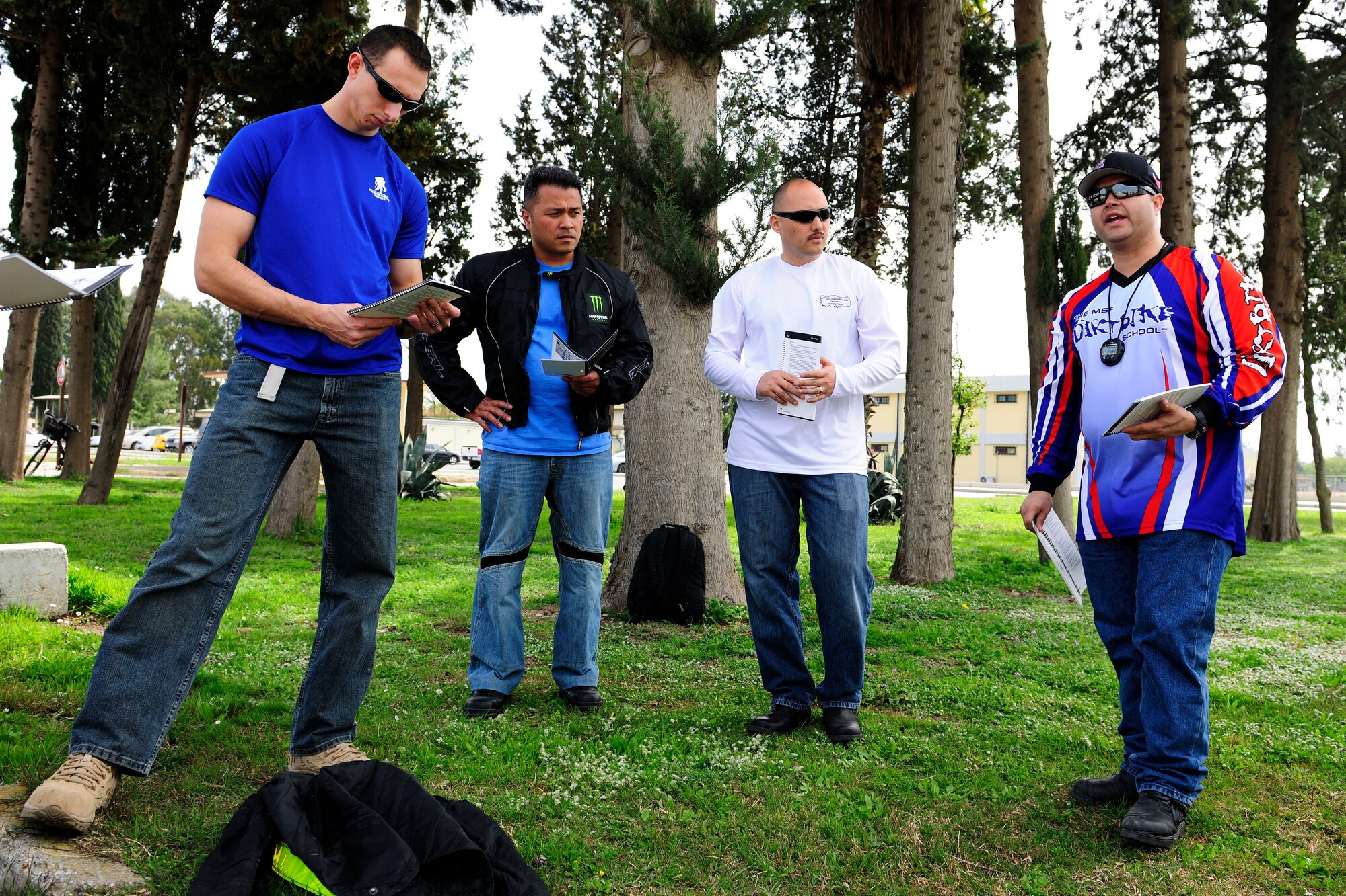 Participants of the Basic Rider Course 2 discuss the courses lesson plan March 27, 2015, at Incirlik Air Base, Turkey. Students of the BRC2 learned advanced riding techniques and other ways to mitigate risk when riding motorcycles. (U.S. Air Force photo by Senior Airman Krystal Ardrey/Released)