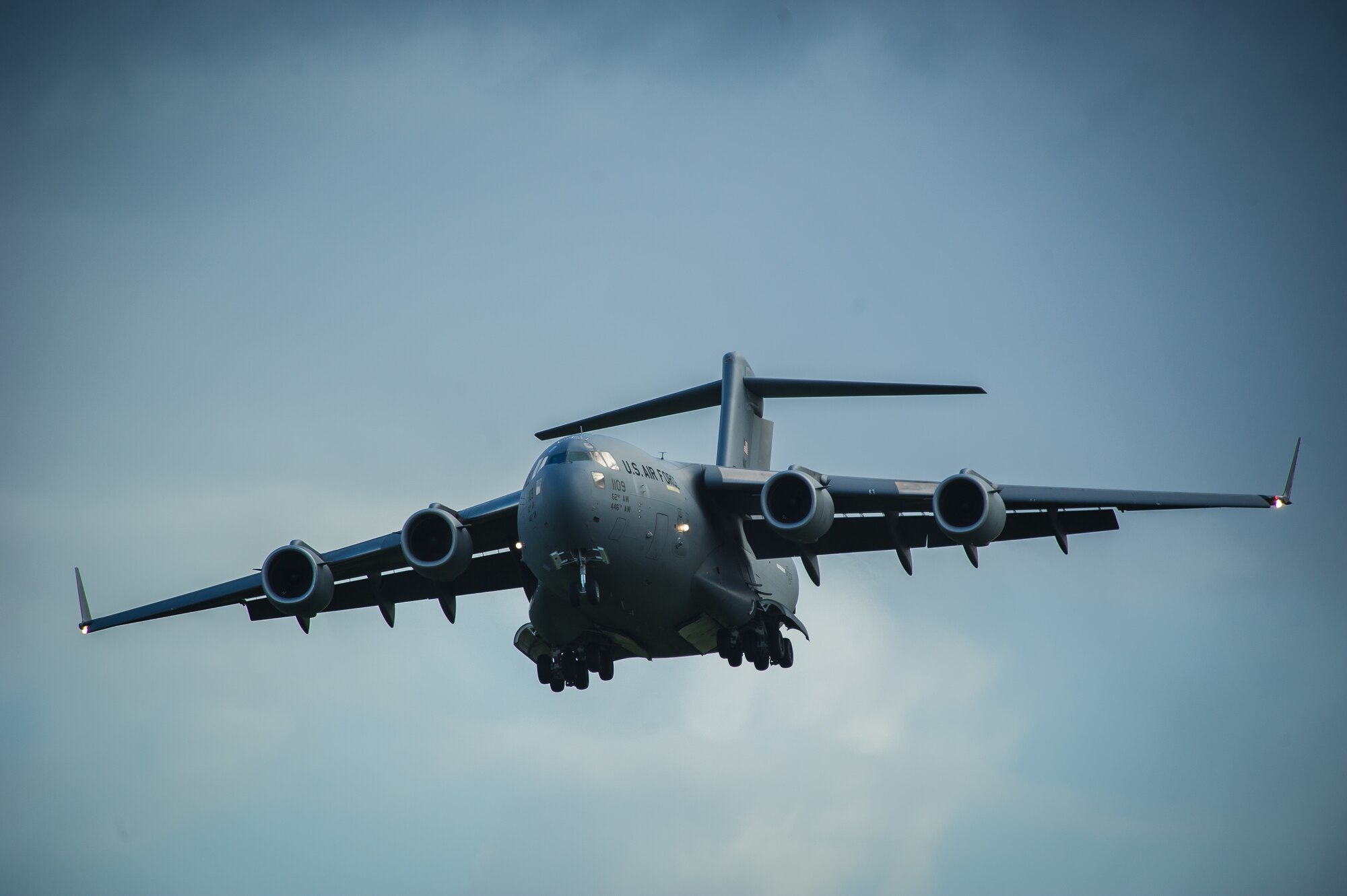 A C-17 Globemaster III from McChord Air Force Base, Wa., prepares to land at Leeuwarden Air Base, Netherlands, April 1, 2015 to deliver equipment for the F-15C theater security package. F-15C Eagles from the Florida and Oregon Air National Guard, assigned to the 159th Expeditionary Fighter Squadron, are deployed to Europe as the first ever ANG TSP here. These F-15s will conduct training alongside our NATO allies to strengthen interoperability and to demonstrate U.S. commitment to the security and stability of Europe. (U.S. Air Force photo/ Staff Sgt. Ryan Crane)