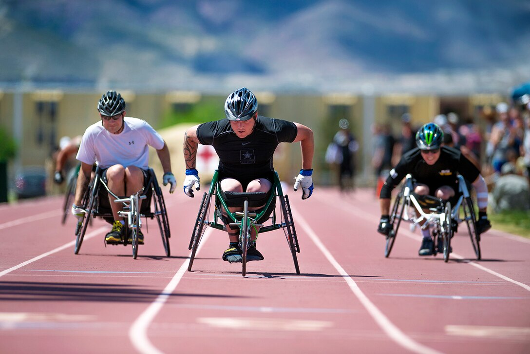 Army athletes compete in the 100-meter wheelchair race during Army Trials on Fort Bliss in El Paso, Texas, April 1, 2015.