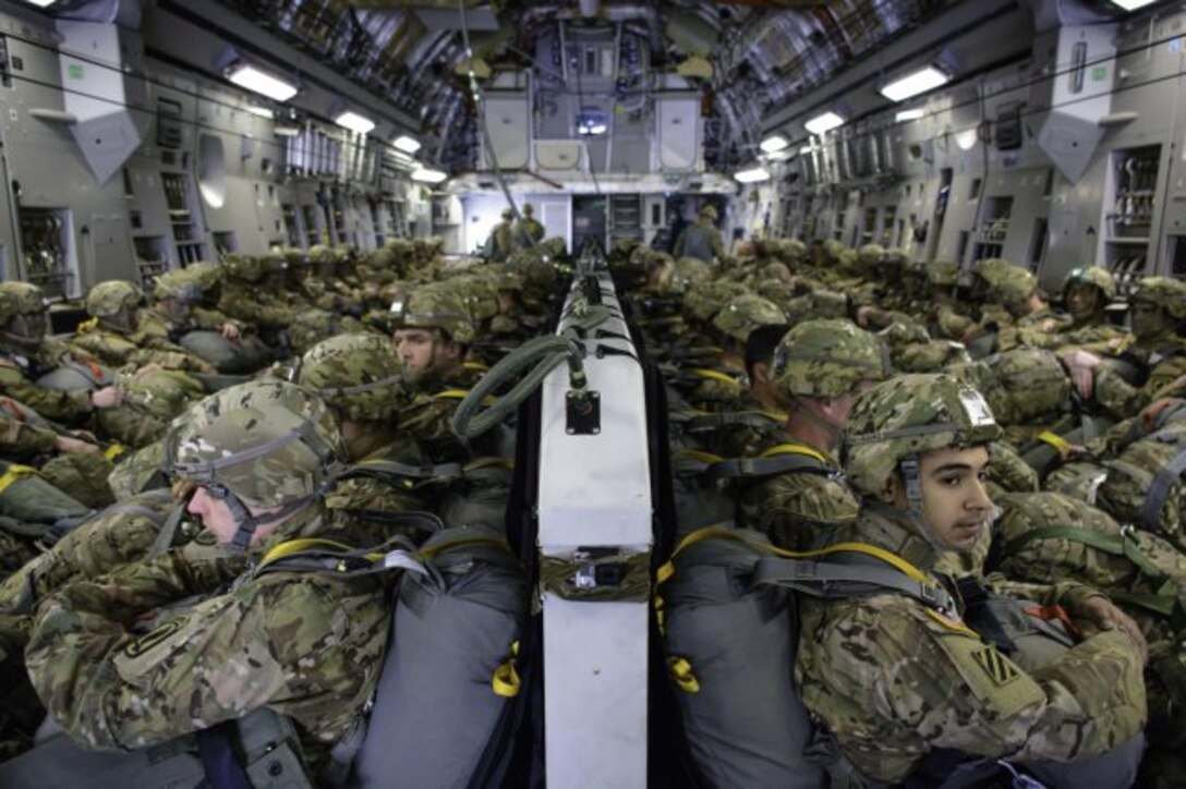 U.S. Army paratroopers await takeoff in a C-17 Globemaster on Aviano Air Base, Italy, March 24, 2015, as part of an emergency deployment exercise in Grafenwoehr, Germany.