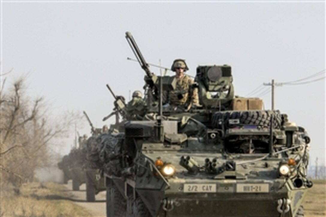U.S. soldiers in Stryker armored vehicles arrive at Smardan Training Area, Romania, March 24, 2015. The soldiers, assigned to 2nd Squadron, 2nd Cavalry Regiment, participated in Saber Junction 15, which included 5,000 troops from 17 nations that are NATO allies and partners.