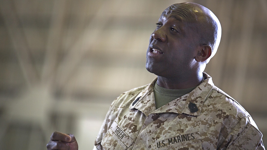 Sergeant Major of the Marine Corps Ronald L. Green speaks to Okinawa-based personnel at a town hall meeting in Marine Medium Tiltrotor Squadron 262’s Hangar 525 March 26 on Marine Corps Air Station Futenma, Okinawa, Japan. Green and the Commandant of the Marine Corps Gen. Joseph F. Dunford, Jr., spoke about about Dunford’s planning guidance and the future of the Corps at various installations across Okinawa. The CMC also answered questions on topics such as women in the infantry and international crisis response. Other questions dealt with the growing field of cyber warfare and the Corps’ tattoo policy. 