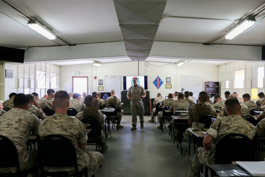 Marines with 2nd Battalion, 1st Marine Regiment, came together to learn and sharpen their skills with a course on machine gun nomenclature, optics and operations aboard Marine Corps Base Camp Pendleton, Calif., March 30, 2015. The fire command and control class is conducted the first week of the three-week course and is vital to the foundational skills of the Marines.