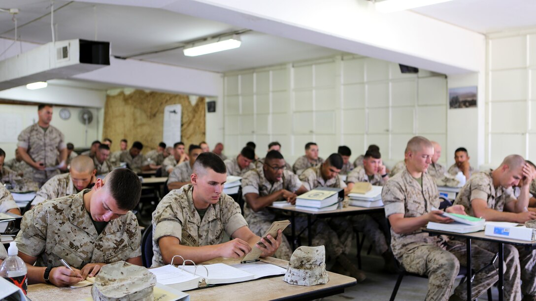 Marines with 2nd Battalion, 1st Marine Regiment, came together to learn and sharpen their skills with a course on machine gun nomenclature, optics and operations aboard Marine Corps Base Camp Pendleton, Calif., March 30, 2015. The fire command and control class is conducted the first week of the three-week course and is vital to the foundational skills of the Marines.