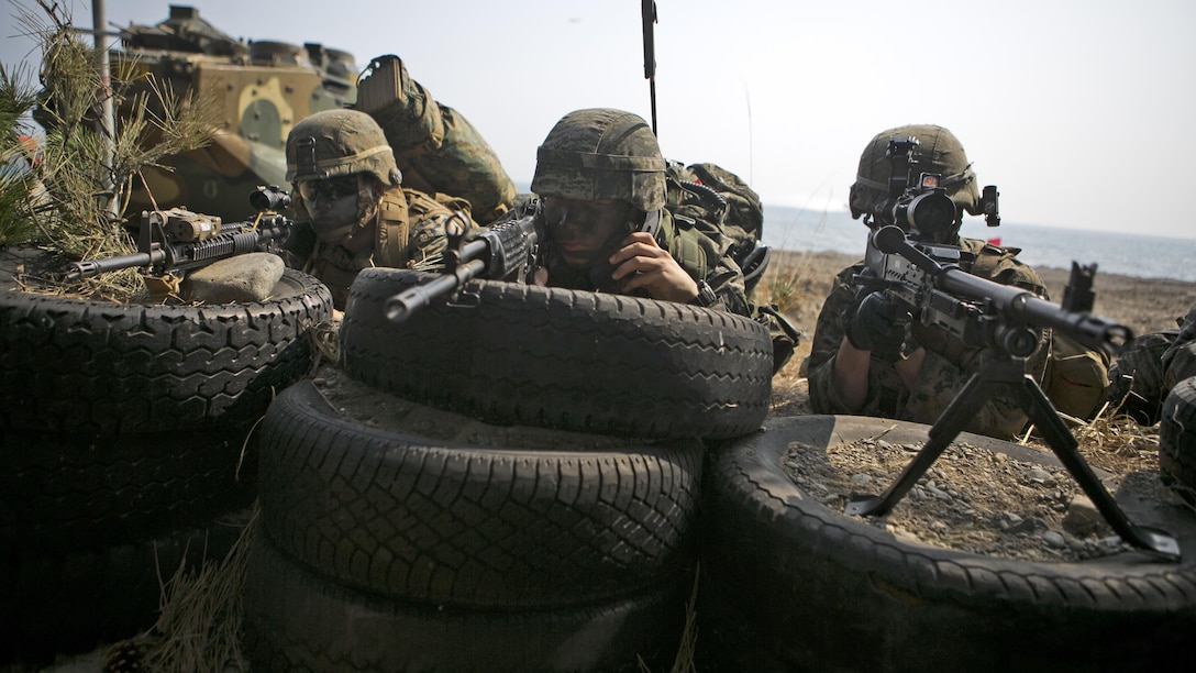 U.S. Marines with Company G, Battalion Landing Team 2nd Battalion, 4th Marines, 31st Marine Expeditionary Unit, provide security during a beach landing exercise with Republic of Korea Marines in the vicinity of Pohang, South Korea, March 30, 2015. The 31st MEU participated in Korean Marine Exchange Program 15. The overall objective of KMEP 15 is to enhance amphibious operations between ROK and U.S. forces that contributes to security and stability on the Korean Peninsula as well as the entire Asia-Pacific region.