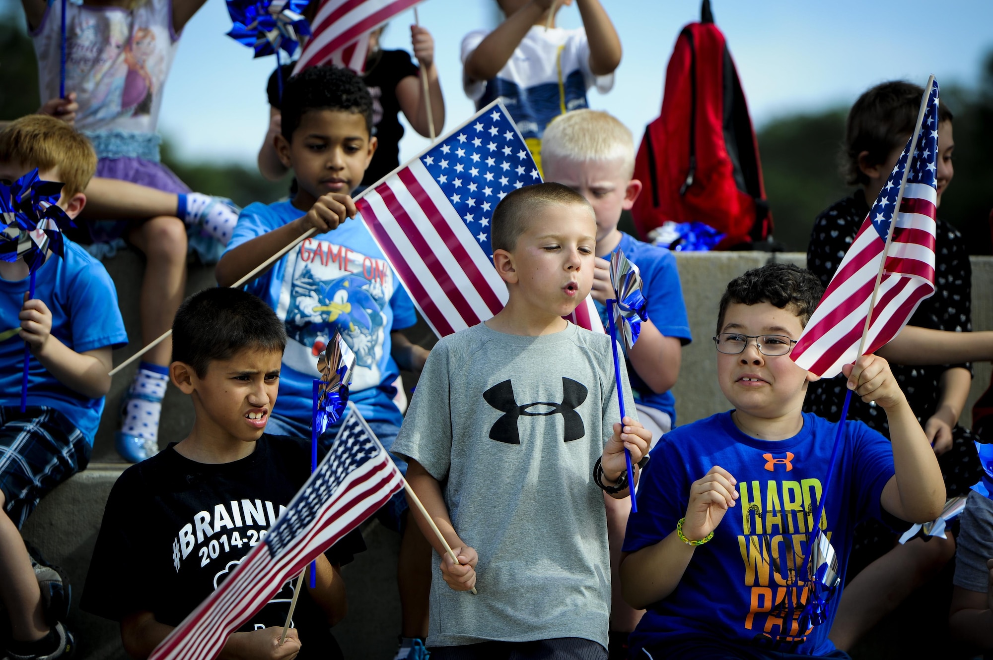 Children from the Youth Center gathered together for Month of the Military Child proclamation signing during the Month of the Military Child and Child Abuse Prevention kickoff on Hurlburt Field, Fla., April 1, 2015.  Hurlburt Field is home to more than 5,500 children who face unique challenges related to military life and culture. (U.S. Air Force photo/Senior Airman Christopher Callaway)