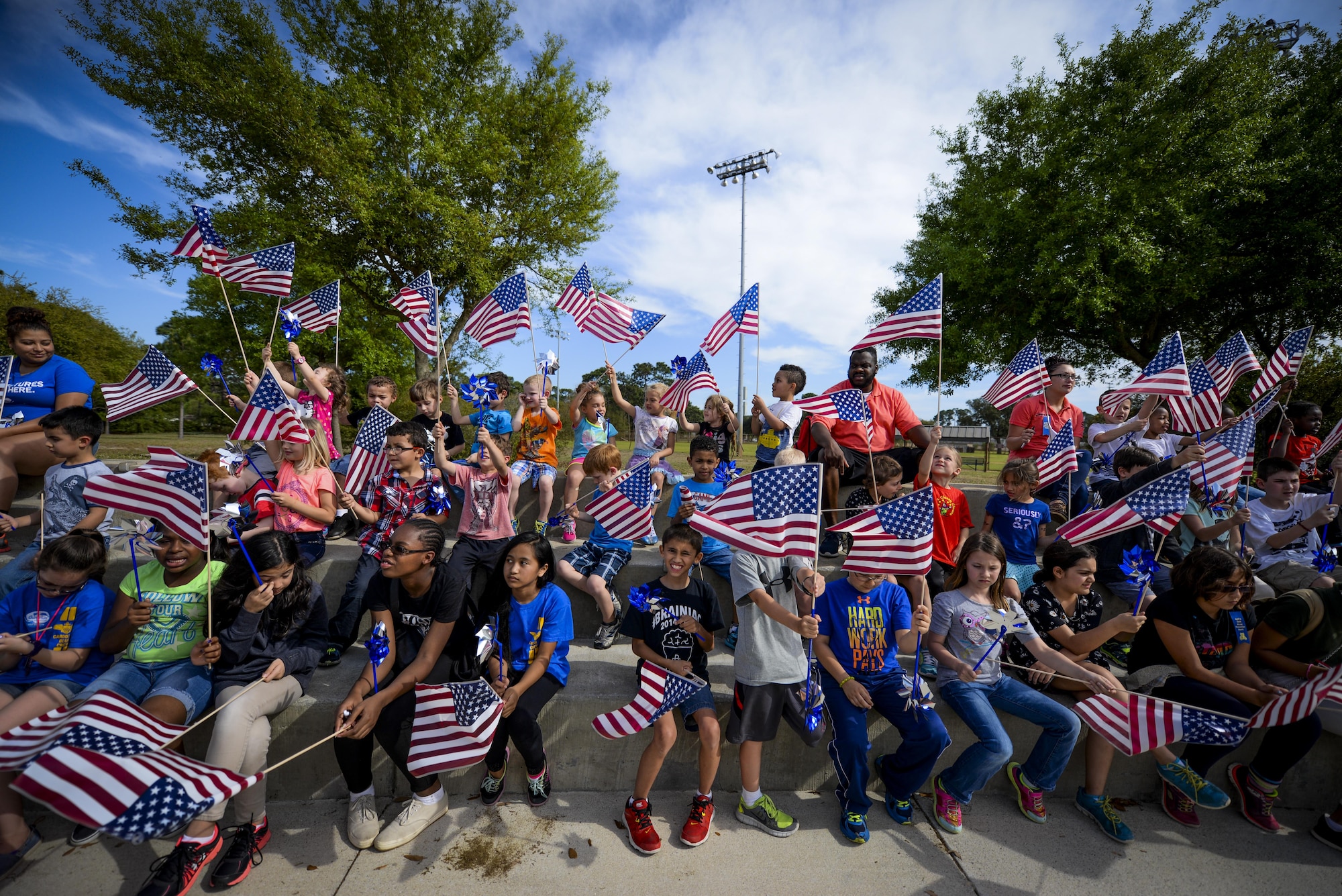 Children from the Youth Center gathered together for Month of the Military Child proclamation signing during the Month of the Military Child and Child Abuse Prevention kickoff on Hurlburt Field, Fla., April 1, 2015.  Hurlburt Field is home to more than 5,500 children who face unique challenges related to military life and culture. (U.S. Air Force photo/Senior Airman Christopher Callaway)