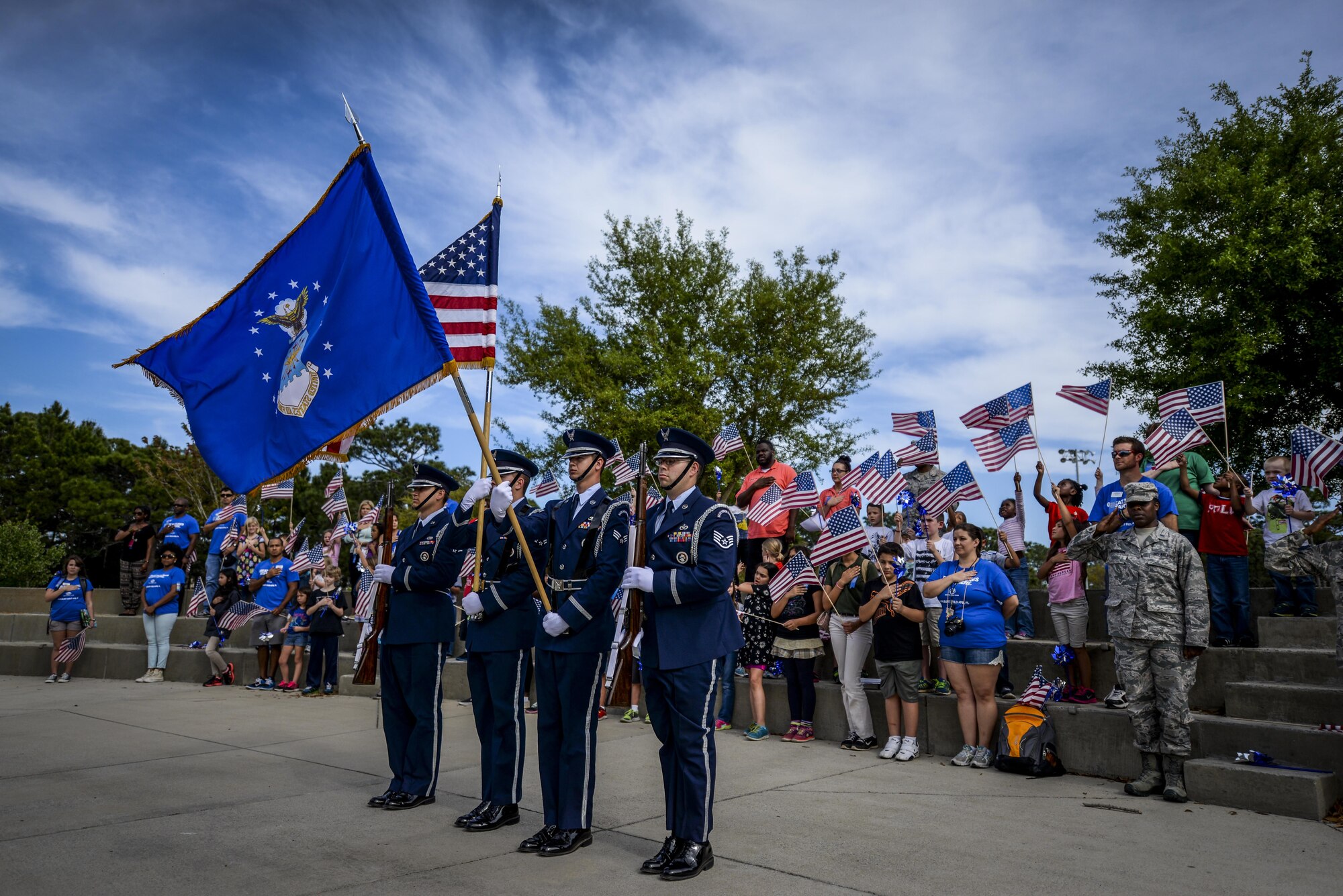 The Hurlburt Field Honor Guard posts the colors during the Month of the Military Child and Child Abuse Prevention Month kickoff on Hurlburt Field, Fla., April 1, 2015. Hurlburt Field is home to more than 5,500 children who face unique challenges related to military life and culture. (U.S. Air Force photo/Senior Airman Christopher Callaway)