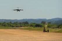A C-17 Globemaster III from the 62nd Airlift Wing lines up for final approach April 2, 2015 at Fort Hunter Liggett, Calif. The C-17 crew conducted training on Semi Prepared Runway Operations at Fort Hunter Liggett and aerial refueling training over Western Washington. (U.S. Air Force photo/ Staff Sgt. Tim Chacon)