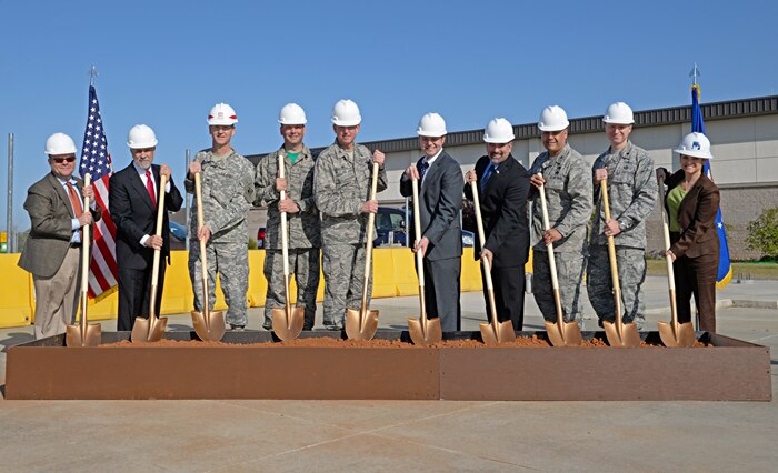 Beale leadership, Congressman John Garamendi representatives, a member of the Army Corps of Engineers, and the facility building contractors break ground for the initiation of construction of the 548th Intelligence, Surveillance, and Reconnaissance Group Distribution Common Ground System Facility at Beale Air Force Base, Calif., April 3, 2015. The DCGS facility is planned to be a two-story 85,000 square foot structure, costing $53.7 million. (U.S. Air Force photo by Airman 1st Class Ramon A. Adelan/Released)