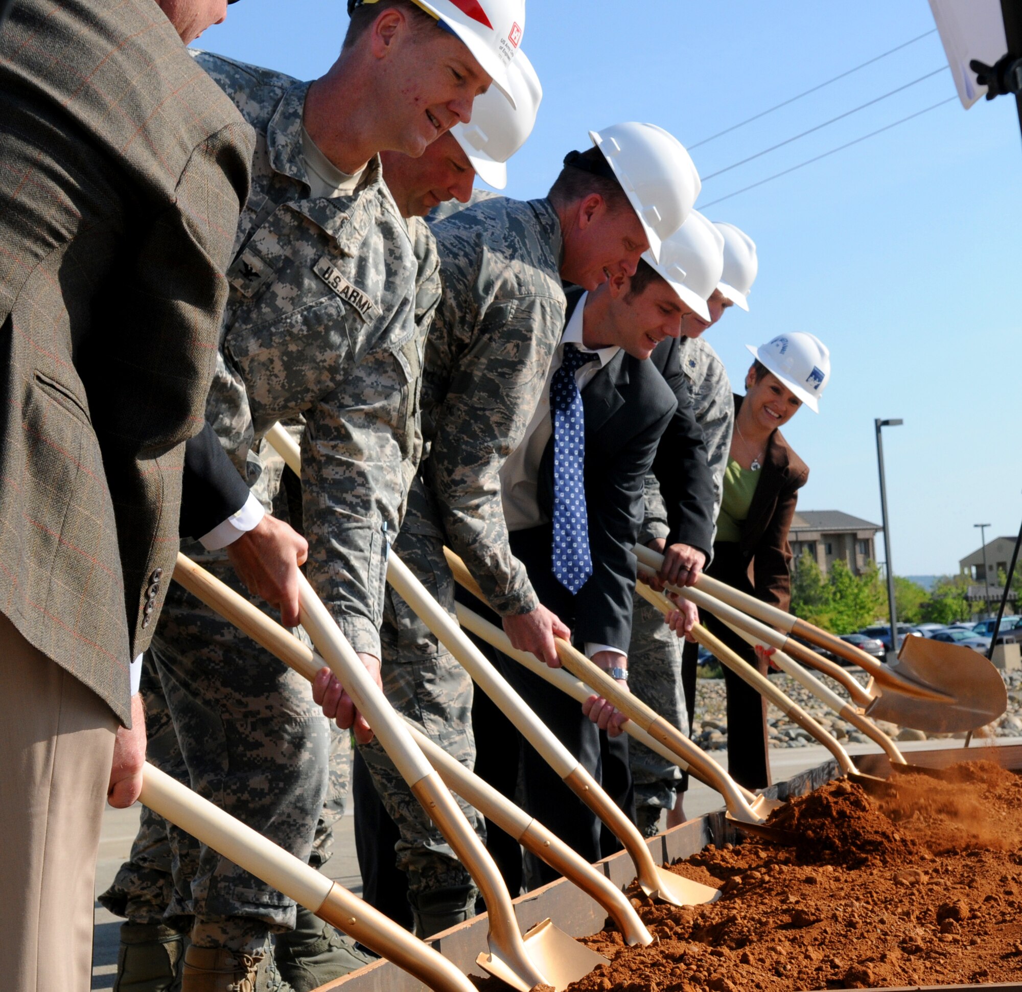 Beale leadership, Congressman John Garamendi representatives, a member of the Army Corps of Engineers, and the facility building contractors break ground for the initiation of construction of the 548th Intelligence, Surveillance, and Reconnaissance Group Distribution Common Ground System Facility at Beale Air Force Base, Calif., April 3, 2015. The DCGS facility is planned to be a two-story 85,000 square foot structure, costing $53.7 million. (U.S. Air Force photo by Airman Preston Cherry/Released)