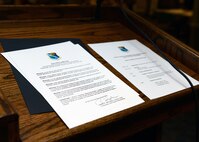 A proclamation signed by Col. Brian Hastings, 47th Flying Training Wing commander, lays on a podium at Club XL on Laughlin Air Force Base, Texas, April 1, 2015. The proclamation states that every Airman at Laughlin, military or civilian, has an individual responsibility to make a positive impact on our community and prevent cases of sexual assault from happening. (U.S. Air Force photo by Airman 1st Class Jimmie D. Pike)(Released)