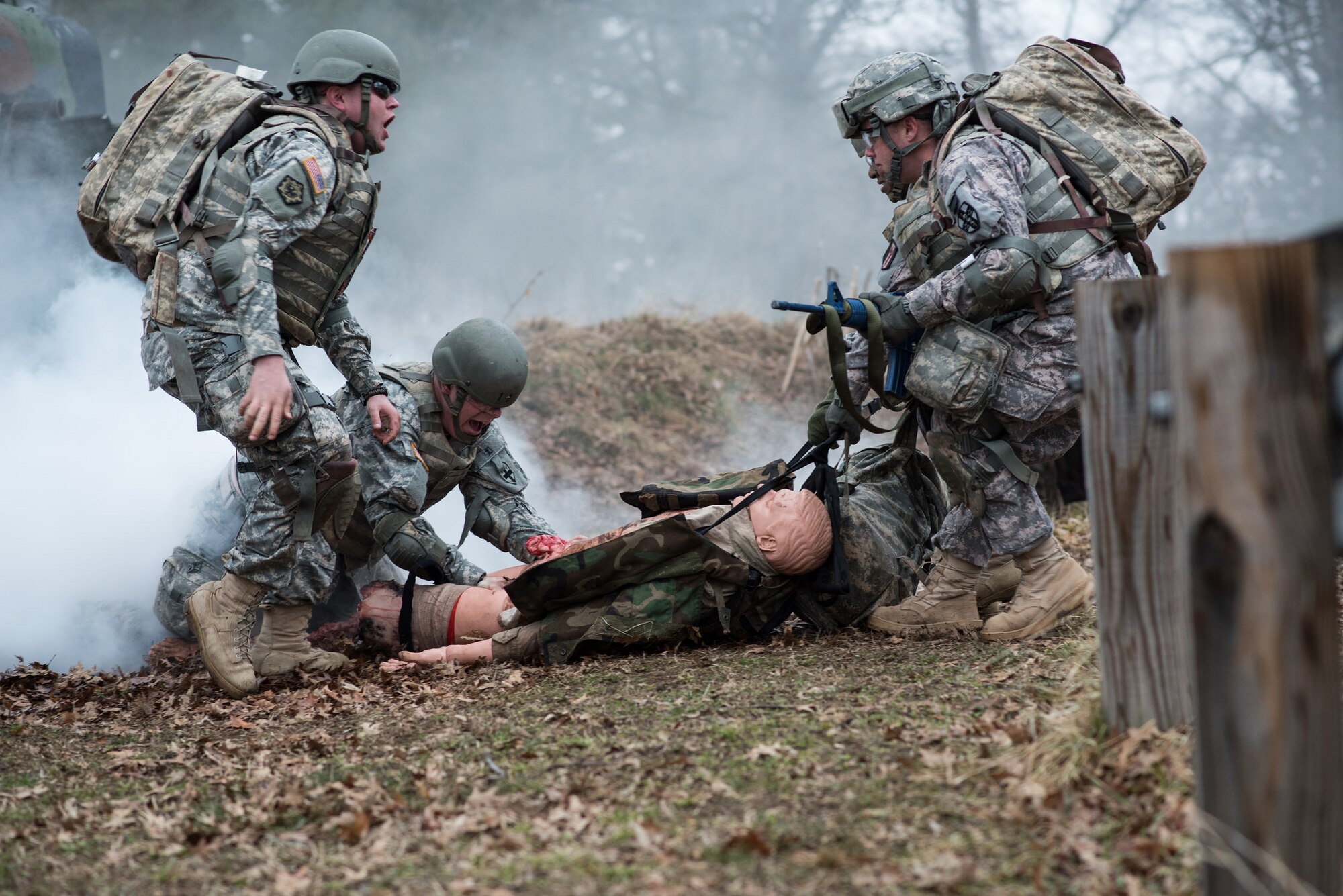 A combat medical response exercise is demonstrated for honorary commanders March 26, 2015, on Joint Base McGuire-Dix-Lakehurst, N.J. Operation Victory was a simulated mission demonstrating military capabilities to community leaders. It is part of a continuing educational series showcasing service members’ support for Joint Base McGuire-Dix-Lakehurst missions and preparations for global operations. (U.S. Air Force photo by Russ Meseroll/Released)