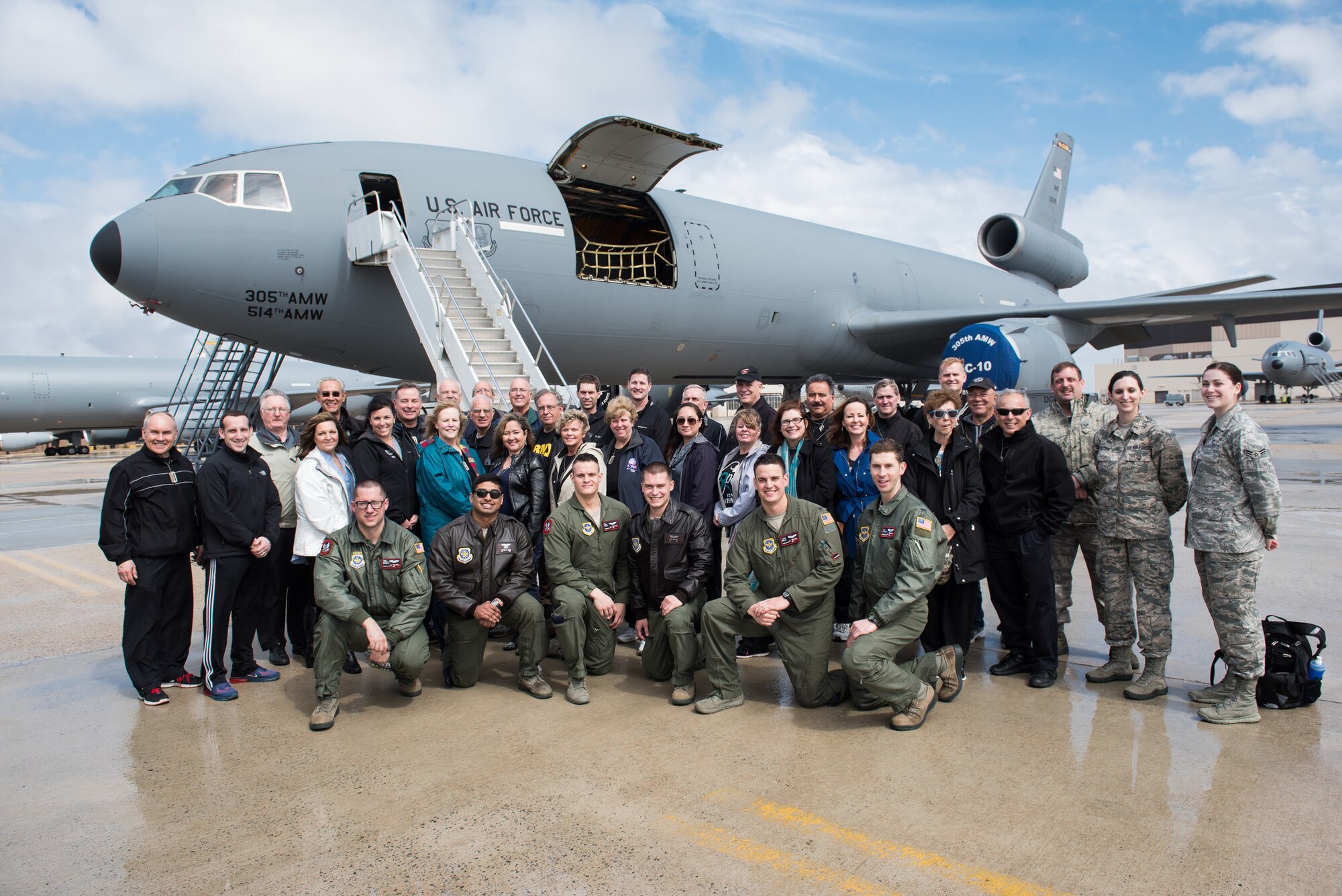 Honorary commanders and Airmen pose for a group photo March 26, 2015 on Joint Base McGuire-Dix-Lakehurst, N.J. Operation Victory was a simulated mission demonstrating military capabilities to community leaders. It is part of a continuing educational series showcasing service members’ support for Joint Base McGuire-Dix-Lakehurst missions and preparations for global operations. (U.S. Air Force photo by Russ Meseroll/Released)