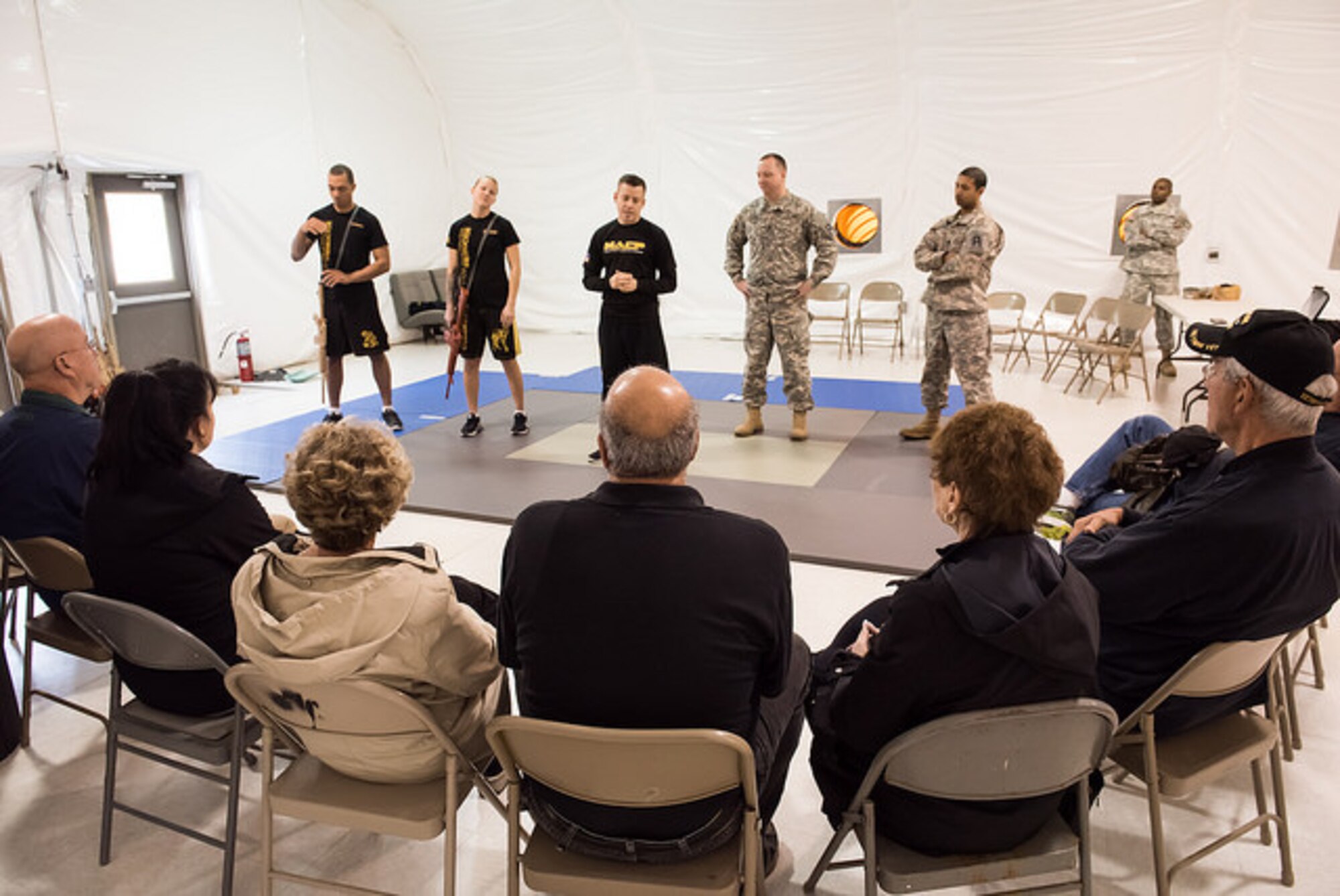 Honorary commanders learn about Army combatives March 26, 2015 on Joint Base McGuire-Dix-Lakehurst, N.J. Operation Victory was a simulated mission demonstrating military capabilities to community leaders. It is part of a continuing educational series showcasing service members’ support for Joint Base McGuire-Dix-Lakehurst missions and preparations for global operations. (U.S. Air Force photo by Russ Meseroll/Released)