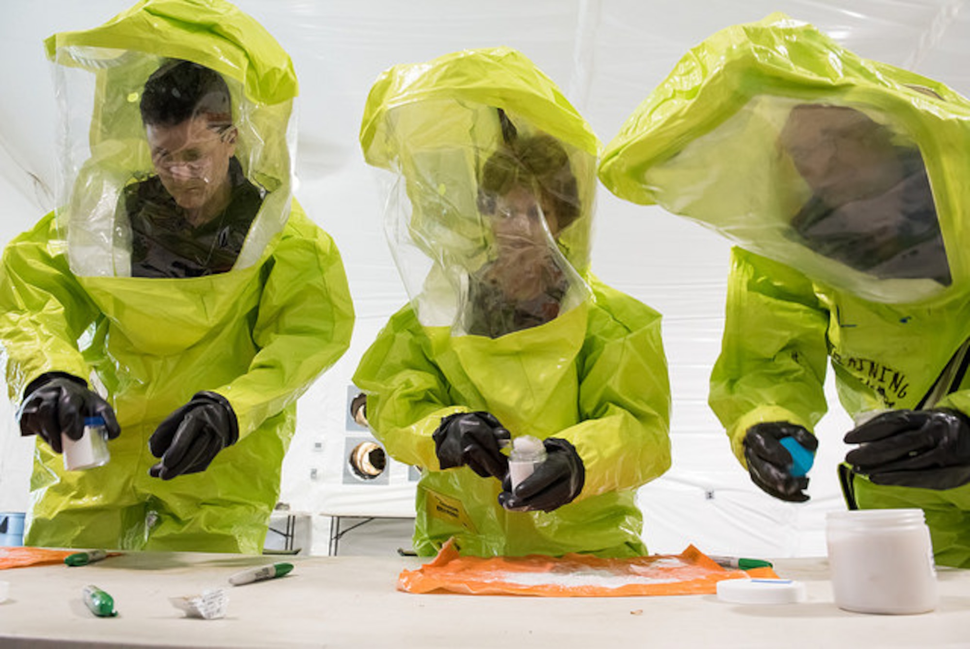Honorary commanders take part in a hazardous material exercise, March 26, 2015, on Joint Base McGuire-Dix-Lakehurst, N.J. Operation Victory was a simulated mission demonstrating military capabilities to community leaders. It is part of a continuing educational series showcasing service members’ support for Joint Base McGuire-Dix-Lakehurst missions and preparations for global operations. (U.S. Air Force photo by Russ Meseroll/Released)