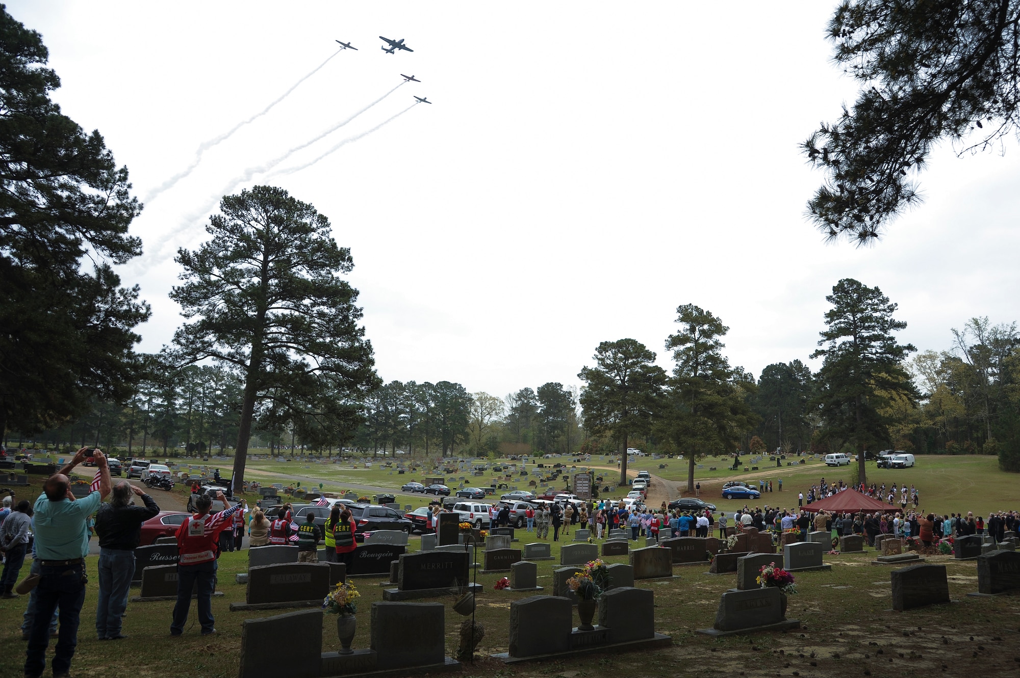 A B-25 and three P-40s fly over the funeral of Lt. Col. Robert Hite April 2, 2015, in Camden, Ark. Hite, 95, was one of the World War II Doolittle Toyko Raiders and died March 29, 2015, in Nashville, Tenn. (U.S. Air Force photo by Airman 1st Class Mercedes Muro)