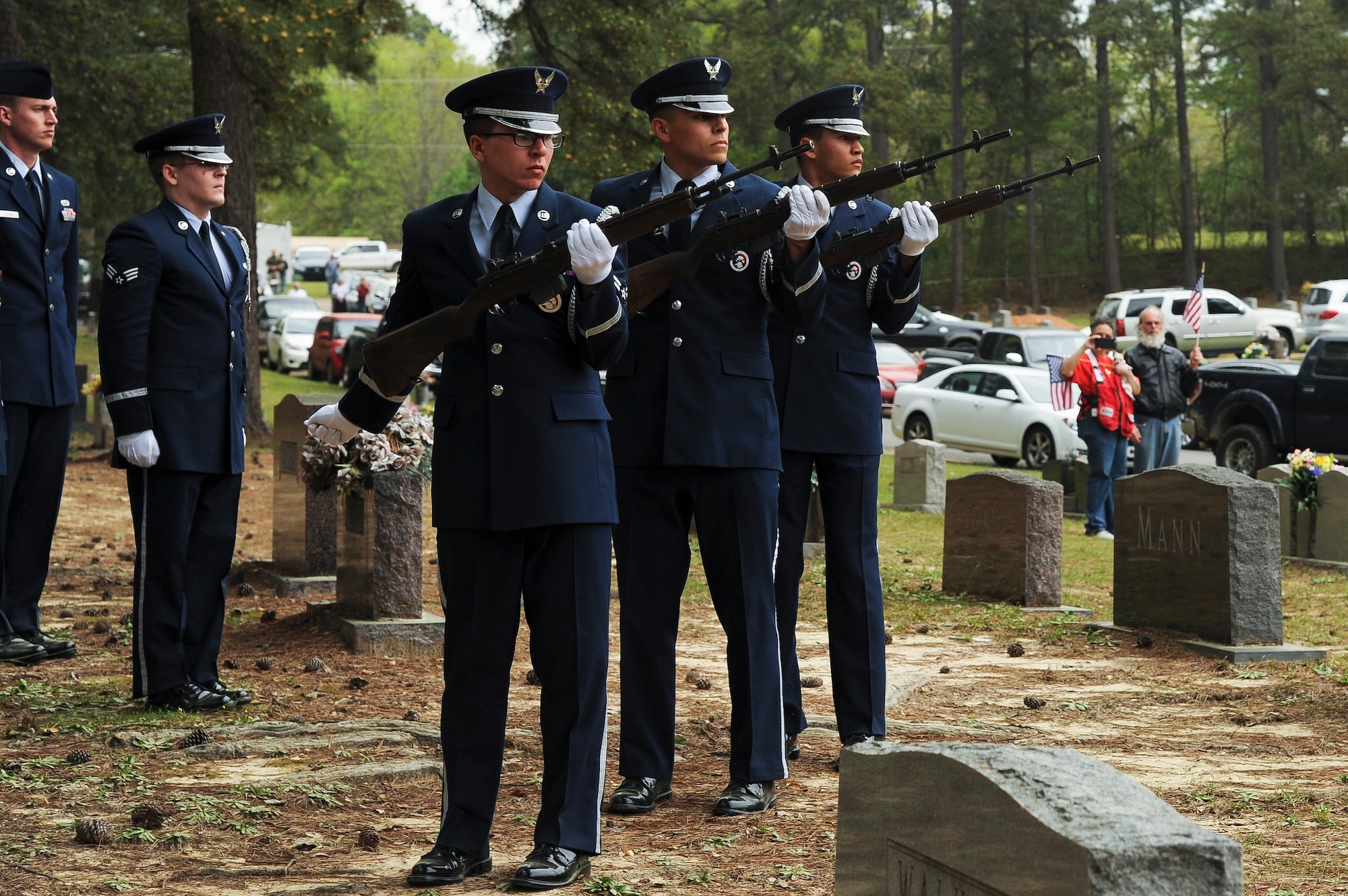 Members of the Little Rock Air Force Base Honor Guard fire M14 rifles to honor Lt. Col. Robert Hite during his funeral April 2, 2015, in Camden, Ark. Including the three-volley gun salute, Hite's family was presented a folded American flag, B-1 flyover, and a formation flyover of one B-25 and three P-40s. (U.S. Air Force photo by Airman 1st Class Mercedes Muro)