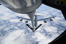 Pilots flying a B-52H from Barksdale Air Force Base, La. prepare to receive fuel from a New Hampshire Air National Guard KC-135R April 2, 2015, near the eastern coast of Canada.  The B-52H was returning home after supporting a U.S. Strategic Command-directed mission to the Arctic and North Sea regions called "Polar Growl.” The mission was to provide a flexible and visible signal that highlights the U.S. ability to deter strategic attacks and respond to any potential future crisis or challenge. (New Hampshire Air National Guard photo by Airman Ashlyn J. Correia)