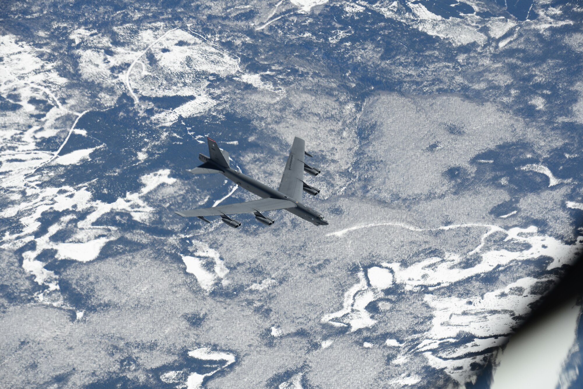 Pilots flying a B-52H from Barksdale Air Force Base, La. break away after receiving fuel from a New Hampshire Air National Guard KC-135R April 2, 2015, near the eastern coast of Canada.  The B-52H was returning home after supporting a U.S. Strategic Command-directed mission to the Arctic and North Sea regions called "Polar Growl.” The mission was to provide a flexible and visible signal that highlights the U.S. ability to deter strategic attacks and respond to any potential future crisis or challenge. (New Hampshire Air National Guard photo by Airman Ashlyn J. Correia)