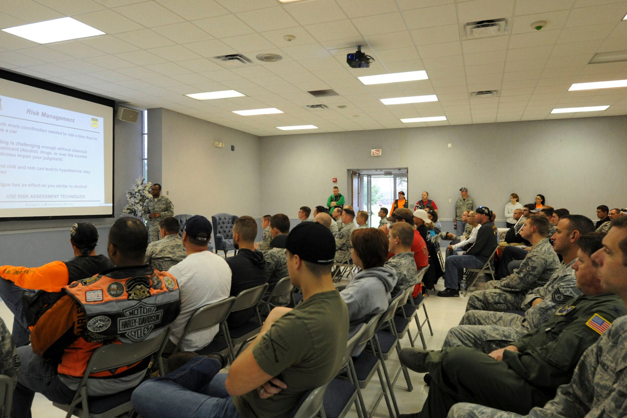 Staff Sgt. Corey Lusk, 2nd Bomb Wing Safety NCO in charge of traffic safety, speaks to Team Barksdale members during the 4th Annual Thunder on the Bayou safety briefing at Chapel 2 on Barksdale Air Force Base, La., April 3, 2015. Motorcycle riders are required to receive an annual safety briefing on topics including mishap risk management, personal protective equipment and mishap trends. (U.S. Air Force photo/ Senior Airman Jannelle Dickey)
